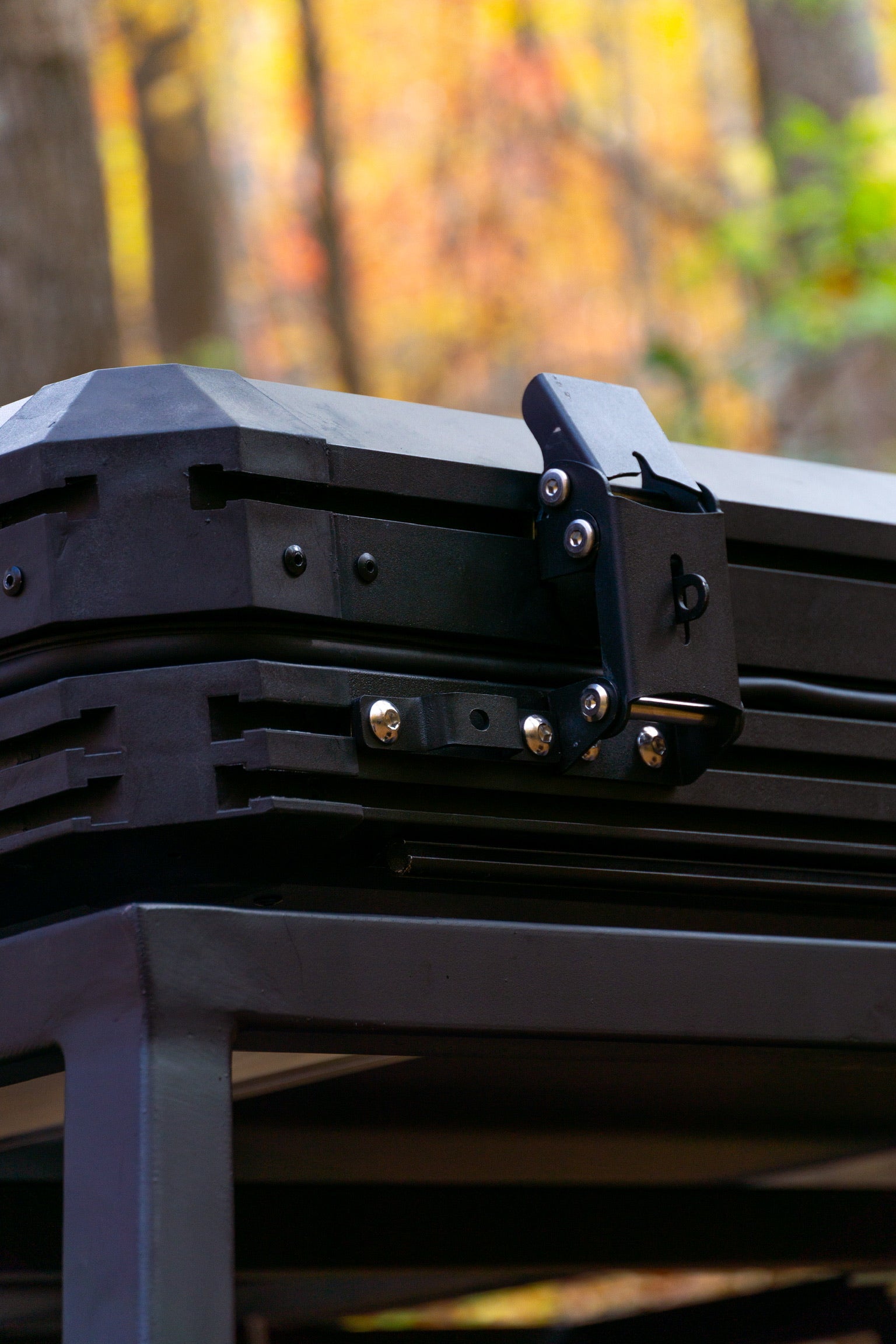 Close up shot of the reinforced corners, thick rubber seal, and solid latches to open and close the tent